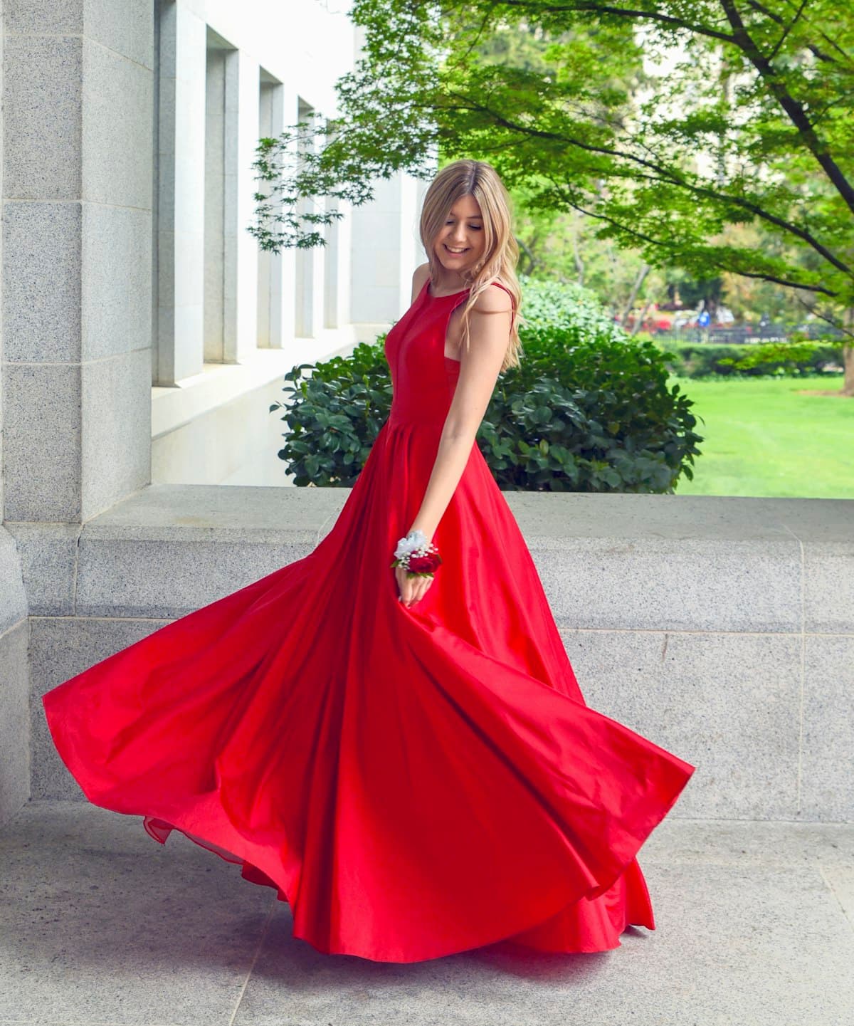 Woman wearing Romeah Siena fluid wrap dress